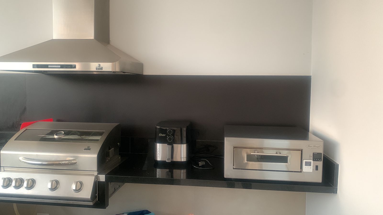 Forno de pizza em área gourmet